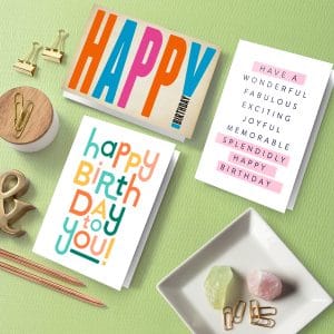 Folded birthday cards laying on a desk